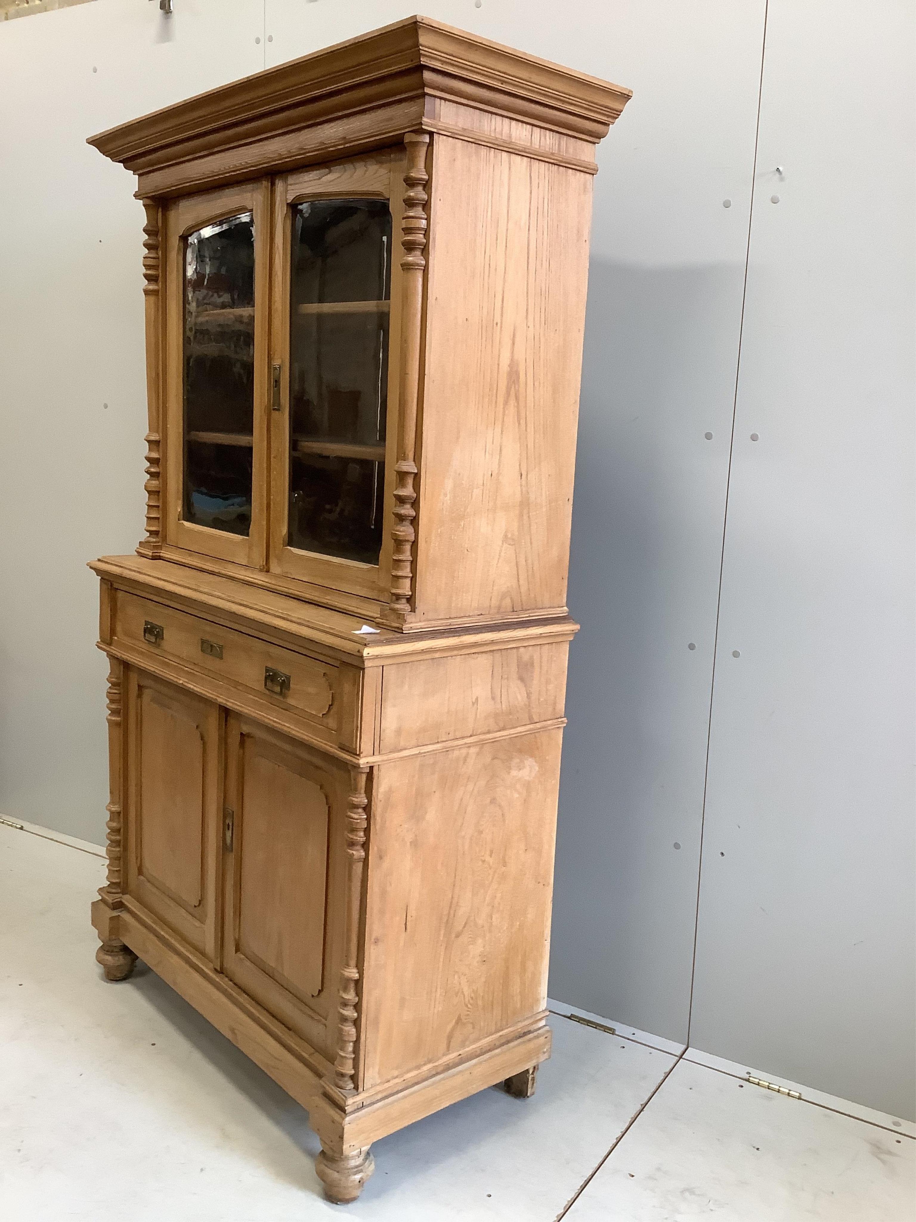 A late 19th century Belgian elm cupboard, width 115cm, depth 50cm, height 190cm